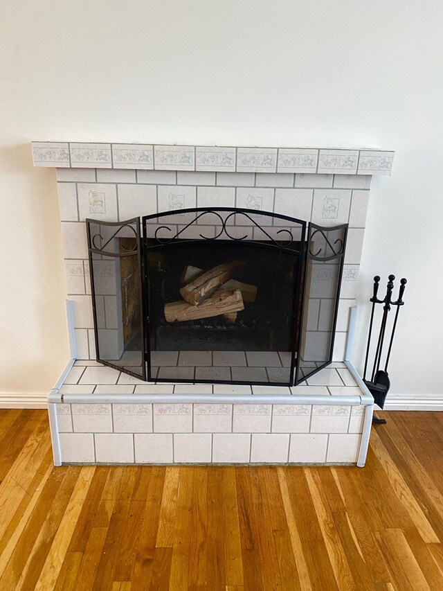 1405 2ND W Hill Dr, Great Falls, MT 59404 - detailed view of wood finished floors and a tiled fireplace