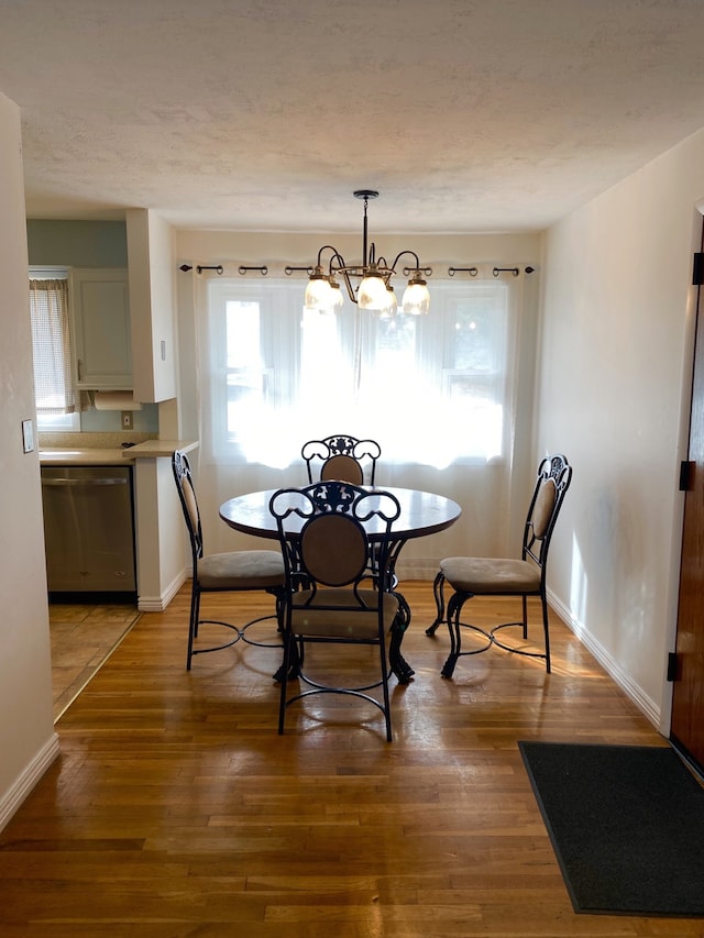 1405 2ND W Hill Dr, Great Falls, MT 59404 - dining space with a chandelier and light wood-style floors