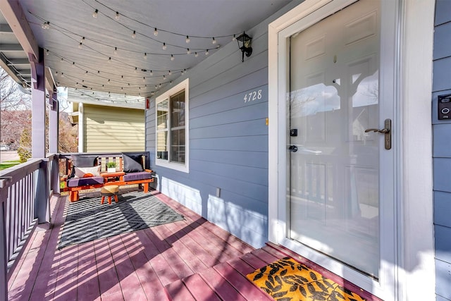 wooden deck with a porch