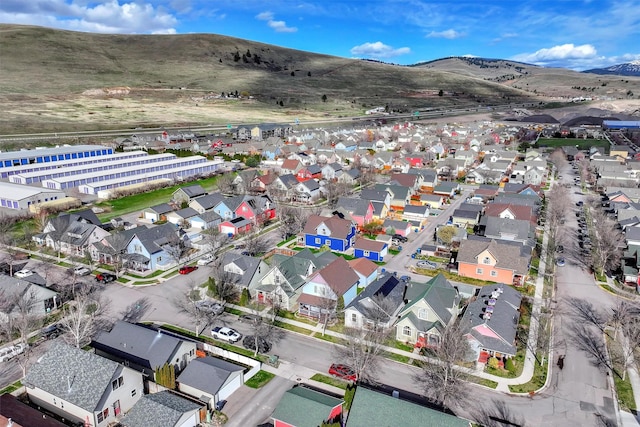 drone / aerial view with a residential view and a mountain view