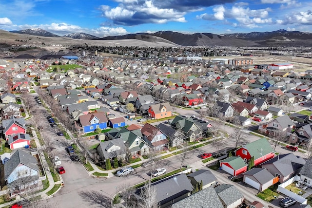 drone / aerial view with a mountain view and a residential view