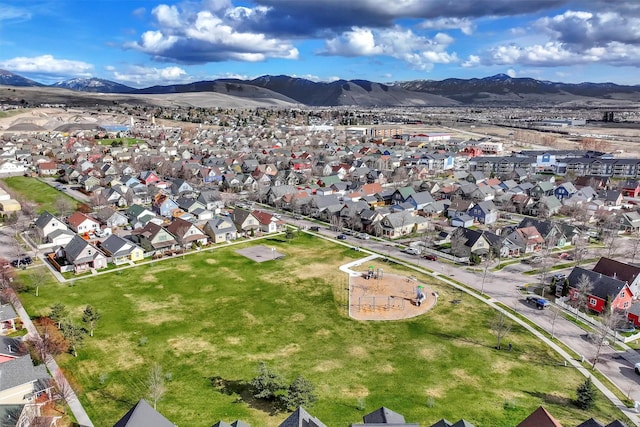 aerial view with a mountain view and a residential view