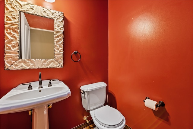 1636 Lake Blaine Rd, Kalispell, MT 59901 - half bathroom with toilet and a sink