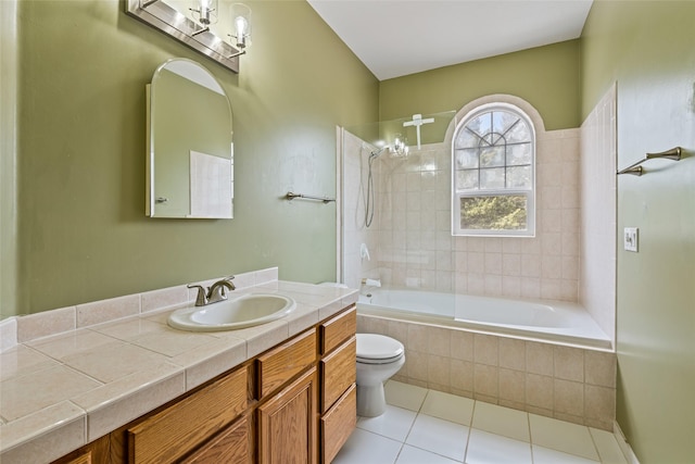 1636 Lake Blaine Rd, Kalispell, MT 59901 - bathroom featuring toilet, tile patterned flooring, vanity, and tiled shower / bath combo