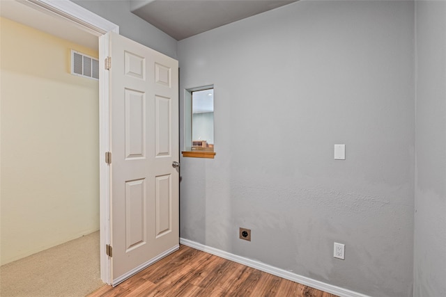 1636 Lake Blaine Rd, Kalispell, MT 59901 - unfurnished room featuring wood finished floors and baseboards