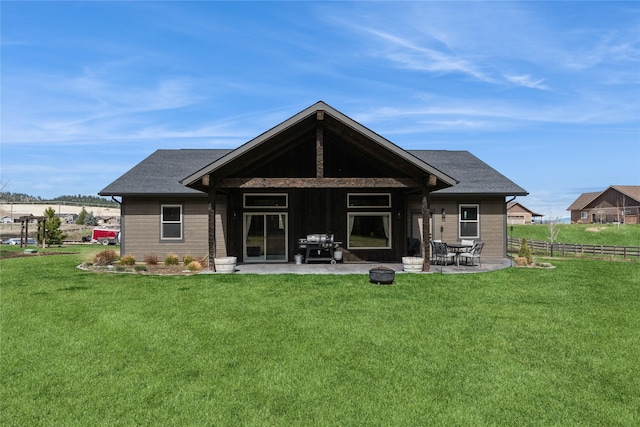 124 Hidden Waters Ln, Kalispell, MT 59901 - back of property with a patio