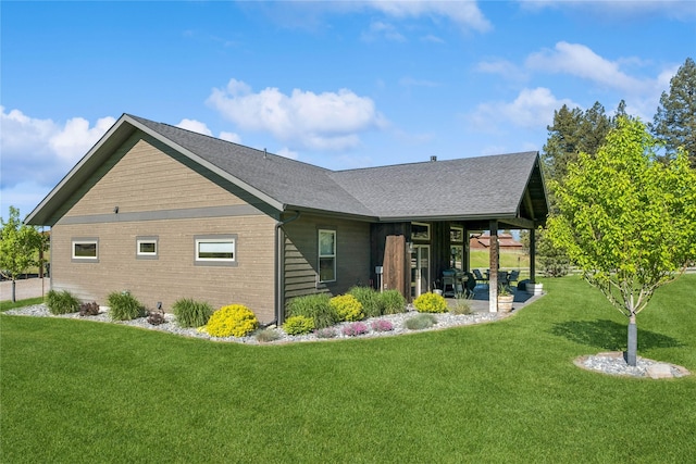 124 Hidden Waters Ln, Kalispell, MT 59901 - back of house with a lawn