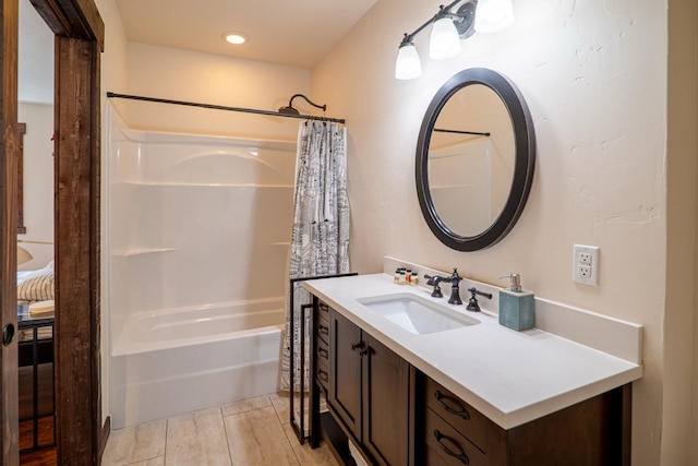 bathroom with vanity and shower / bath combination with curtain