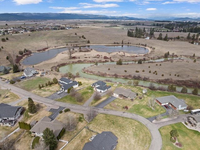 344 Stillwater Loop, Kalispell, MT 59901 - view of property location with a water and mountain view and nearby suburban area