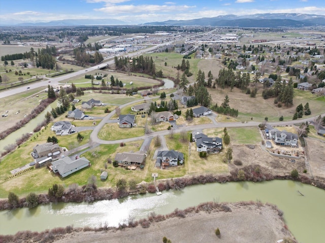 344 Stillwater Loop, Kalispell, MT 59901 - aerial overview of property's location with a water and mountain view and nearby suburban area