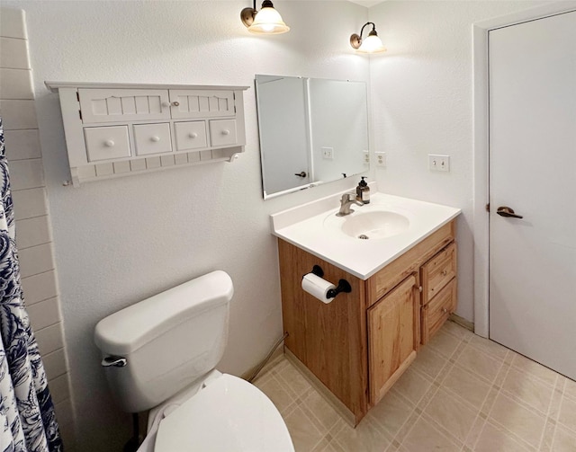 full bath with tile patterned floors, toilet, vanity, and a shower with curtain