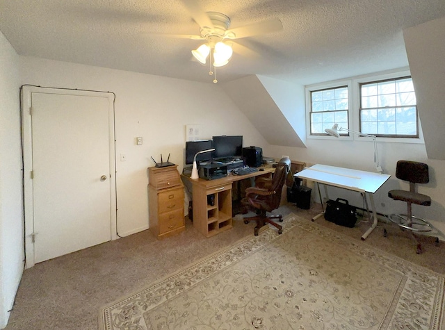 office area with a textured ceiling and a ceiling fan