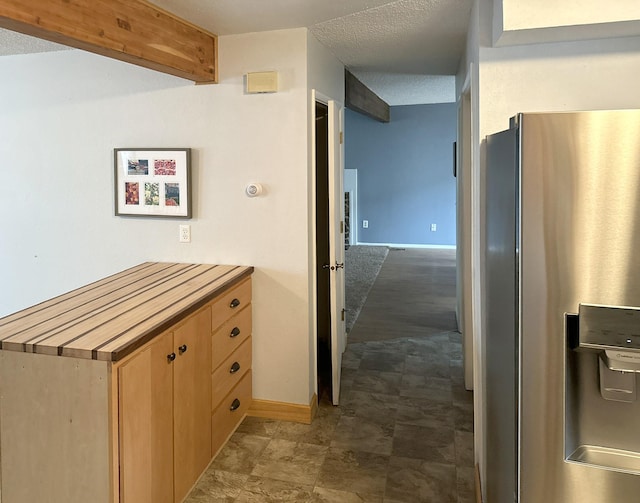 interior space featuring baseboards