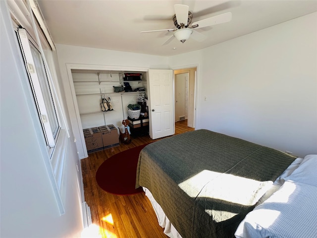 767 33rd Ave NE, Great Falls, MT 59404 - bedroom with wood finished floors, a closet, and a ceiling fan