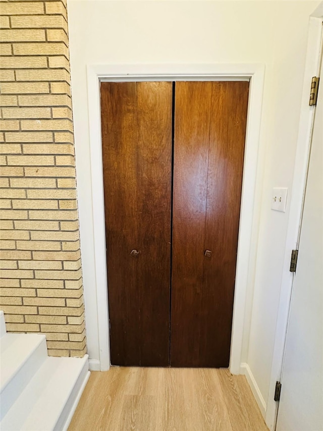 767 33rd Ave NE, Great Falls, MT 59404 - detailed view of wood finished floors and brick wall