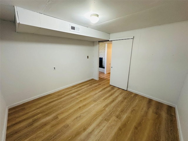767 33rd Ave NE, Great Falls, MT 59404 - unfurnished bedroom featuring light wood-style floors and baseboards