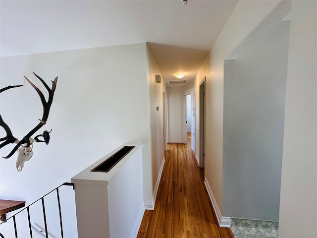767 33rd Ave NE, Great Falls, MT 59404 - hallway with wood finished floors and an upstairs landing