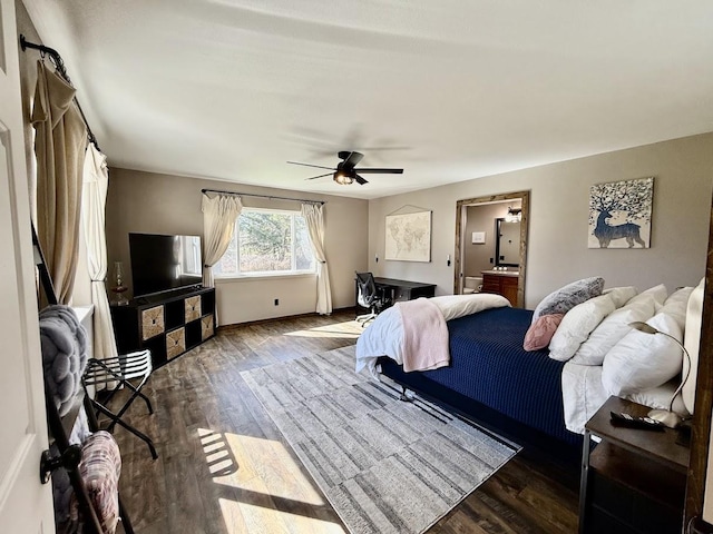 992 Trumble Creek Rd, Kalispell, MT 59901 - bedroom with wood finished floors, ceiling fan, and connected bathroom