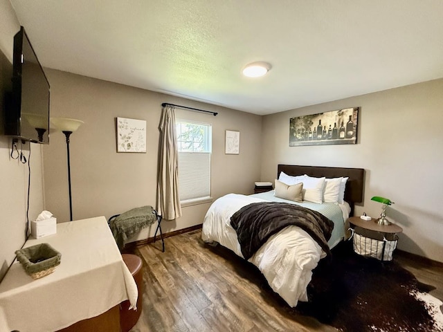 992 Trumble Creek Rd, Kalispell, MT 59901 - bedroom with wood finished floors and baseboards