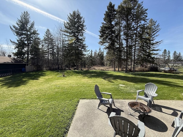 992 Trumble Creek Rd, Kalispell, MT 59901 - view of yard with an outdoor fire pit and a patio