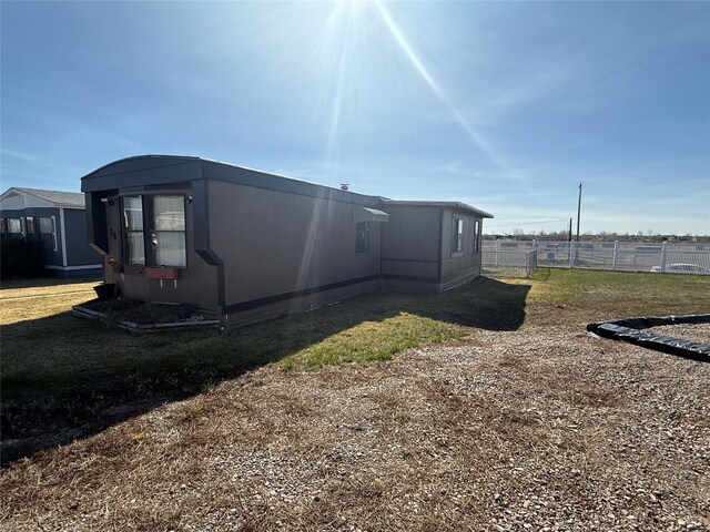 3805 7th St NE Unit 26, Great Falls, MT 59404 - view of side of property with fence