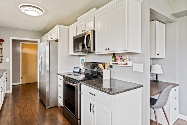 2324 Cloverdale Dr, Missoula, MT 59803 - kitchen with stainless steel appliances, dark wood-style flooring, and white cabinetry