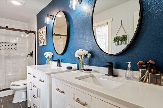 2324 Cloverdale Dr, Missoula, MT 59803 - full bathroom featuring a stall shower and two vanities