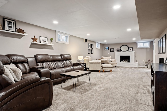 2324 Cloverdale Dr, Missoula, MT 59803 - living area with light colored carpet, healthy amount of natural light, recessed lighting, and a brick fireplace