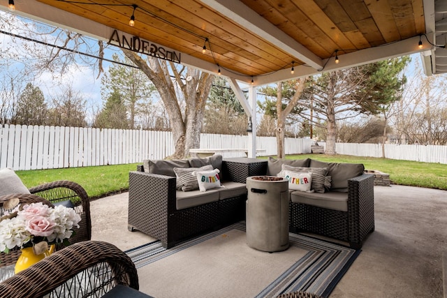 2324 Cloverdale Dr, Missoula, MT 59803 - fenced backyard featuring an outdoor living space with a fire pit and a patio