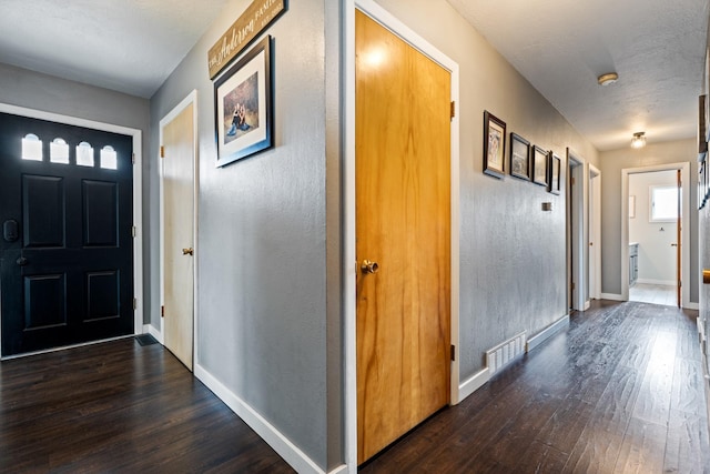 2324 Cloverdale Dr, Missoula, MT 59803 - entrance foyer featuring dark wood-style flooring and baseboards