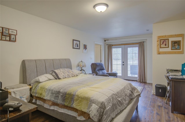 bedroom with dark wood-type flooring, french doors, and access to outside