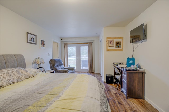 bedroom featuring french doors, access to outside, baseboards, and wood finished floors