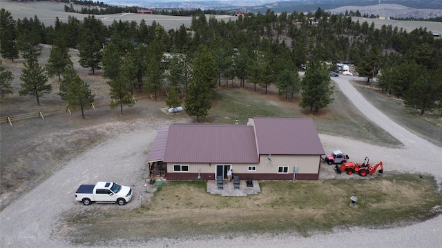 drone / aerial view featuring a mountain view