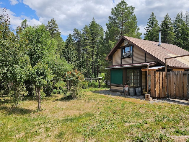 64 Ponderosa Ln, Thompson Falls, MT 59873 - view of property exterior with cooling unit and a metal roof