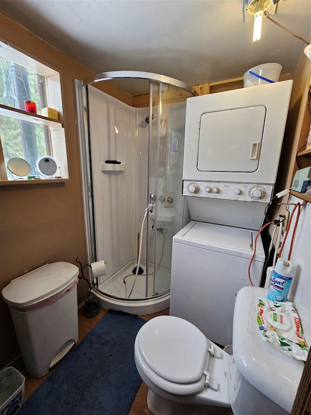 64 Ponderosa Ln, Thompson Falls, MT 59873 - full bathroom with stacked washer / drying machine and a stall shower