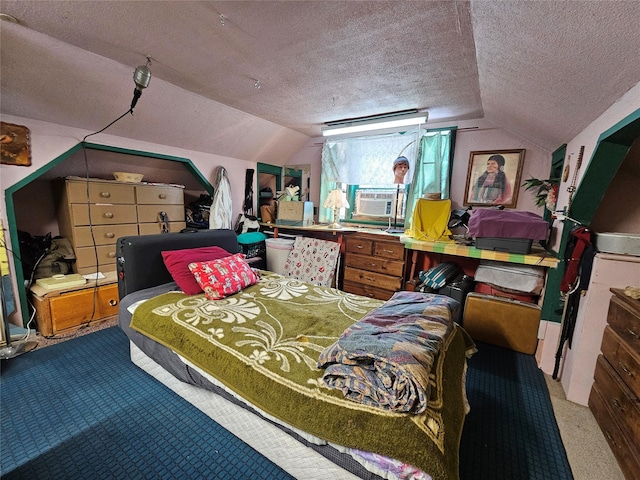64 Ponderosa Ln, Thompson Falls, MT 59873 - bedroom featuring vaulted ceiling, a textured ceiling, carpet floors, and cooling unit