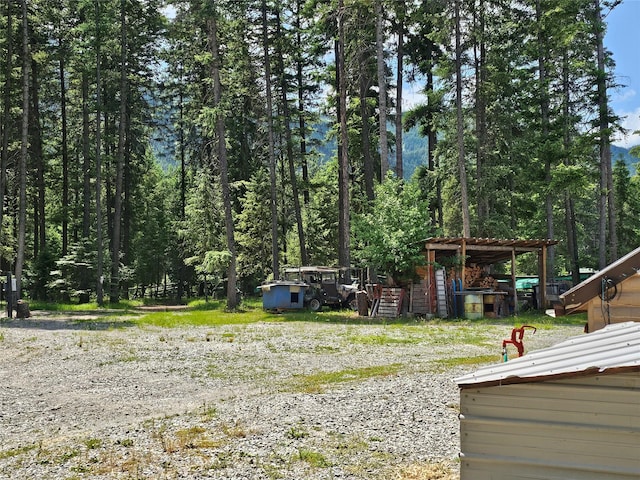 64 Ponderosa Ln, Thompson Falls, MT 59873 - view of yard with a forest view