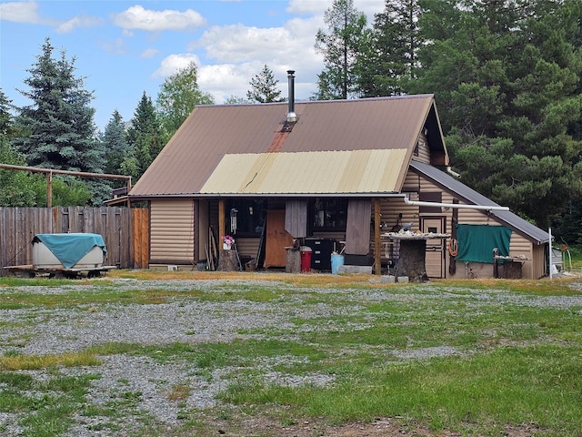 64 Ponderosa Ln, Thompson Falls, MT 59873 - view of front of house with a metal roof