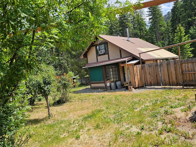 64 Ponderosa Ln, Thompson Falls, MT 59873 - back of property with a metal roof