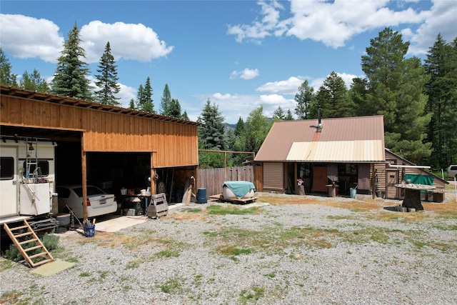 64 Ponderosa Ln, Thompson Falls, MT 59873 - view of yard with an outbuilding, an outdoor structure, and a garage