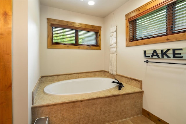 full bathroom featuring a garden tub