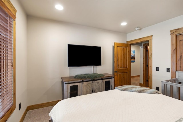 carpeted bedroom with recessed lighting and baseboards