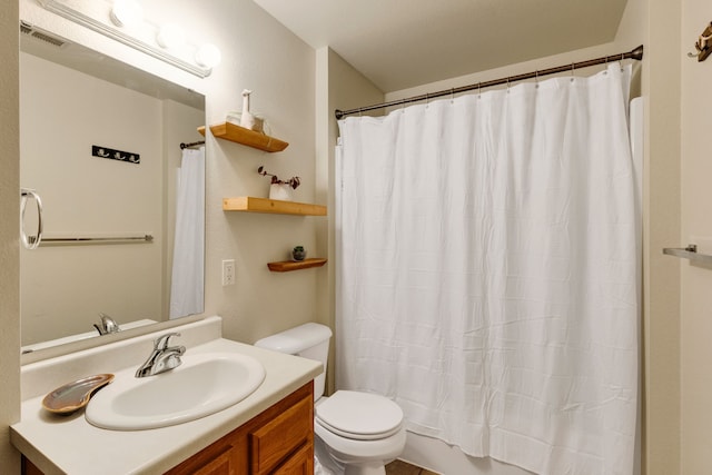 1923 Montana St Unit B, Missoula, MT 59801 - full bath with shower / bath combo, visible vents, toilet, and vanity