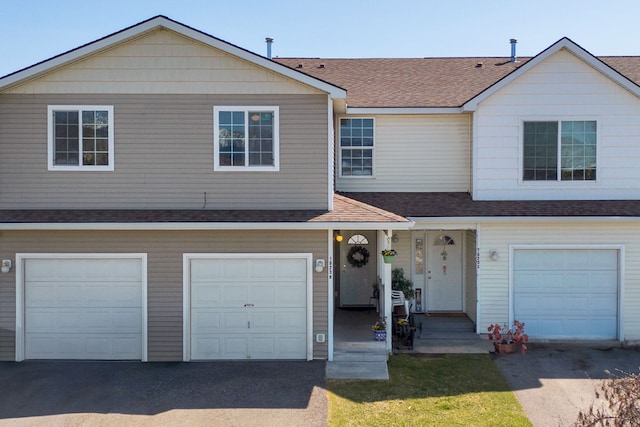 1923 Montana St Unit B, Missoula, MT 59801 - multi unit property featuring a shingled roof, a garage, and aphalt driveway