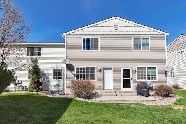 1923 Montana St Unit B, Missoula, MT 59801 - back of house featuring a yard, entry steps, and a patio area