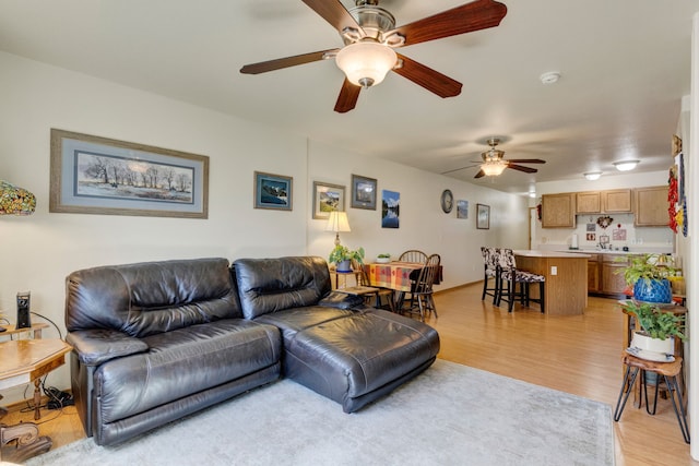 1923 Montana St Unit B, Missoula, MT 59801 - living area featuring light wood-style flooring and ceiling fan