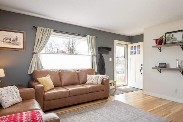 1634 W Central Ave, Missoula, MT 59801 - living room with light wood-style floors and baseboards