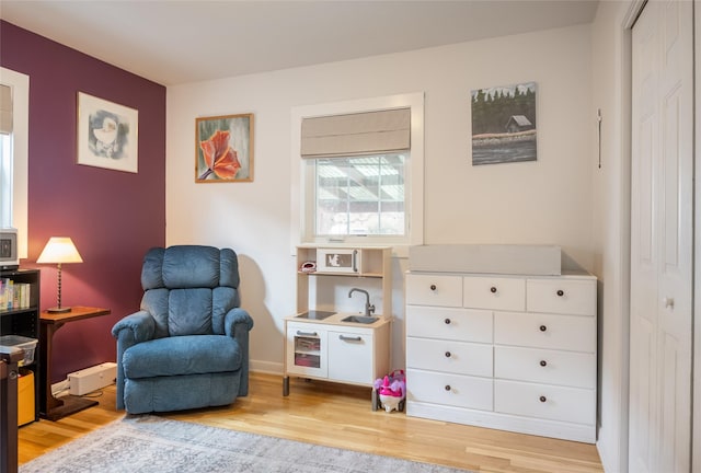 1634 W Central Ave, Missoula, MT 59801 - living area with light wood-style floors and baseboards
