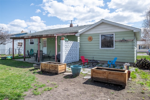 1634 W Central Ave, Missoula, MT 59801 - back of house featuring an outdoor fire pit and a patio area