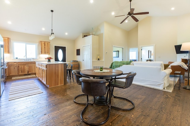 716 Shadow Dancer Way, Stevensville, MT 59870 - dining room with dark wood finished floors, ceiling fan, high vaulted ceiling, and recessed lighting